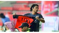 Al Rayyan striker Rodrigo Tabata celebrates after scoring his 100th goal in Qatar.