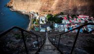 (FILES) This file picture taken on October 15, 2017 from a hill shows a general view of Saint Helena's capital Jamestown, on the British Overseas Territory of Saint Helena. AFP / GIANLUIGI GUERCIA
