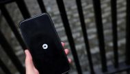 The Uber logo is seen on mobile phone. REUTERS/Hannah McKay 