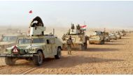 A file photo of Iraqi forces vehicles after they captured Rawa, the last remaining town under ISIS control. Reuters.