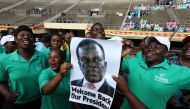 People wait for the inauguration ceremony to swear in Zimbabwe's former vice president Emmerson Mnangagwa as president in Harare, Zimbabwe, November 24, 2017. REUTERS/Mike Hutchings

