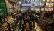 Commuters descend the stairs to catch the tube at Oxford Circus Station in central London on November 24, 2017, following an incident. Police rushed to London's Oxford Circus on Friday, sparking fears of a terror attack, but they have now stood down after