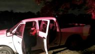 A handout photo released by the State Police of Xalapa, Veracruz, shows the truck with the corpses of the mayor of Ixhutlan de Madero, Victor Manuel Espinoza Tolentino and his wife Irma Carrera Tinoco on a road between Banderilla and Xalapa, Veracruz stat