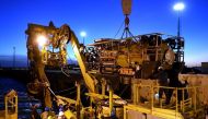 This handout picture released by U.S. Navy shows Undersea Rescue Command (URC) and Argentine construction workers preparing the motor vessel Sophie Siem for the installation of the Submarine Rescue Diving and Recompression System (SRDRS) which operates th