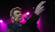 (FILES) This file photo taken on December 6, 2003 shows French singer Johnny Hallyday performing on stage in Clermont-Ferrand. AFP / THIERRY ZOCCOLAN