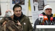 Former Georgian President Mikheil Saakashvili talks to his supporters, who say they were injured in clashes with the police, in front of the Parliament building in Kiev, Ukraine December 6, 2017. REUTERS/Oleh Tereshchenko
