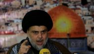 Iraqi Shi'ite Muslim leader Moqtada al-Sadr gestures as he delivers a speech over U.S.President Donald Trump's decision to recognize Jerusalem as the capital of Israel, in Baghdad, Iraq December 7, 2017. REUTERS/Alaa al-Marjani.