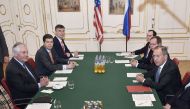 US Secretary of Stae Rex Tillerson (L) and Russian foreign minister Sergei Lavrov (R) hold bilateral talks during the 24th OSCE Ministerial Council in Vienna, on December 07, 2017.  AFP / HANS PUNZ
