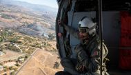 US Navy shows Naval Aircrewman (Helicopter) 1st Class Justin Greene assigned to the 
