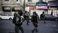 Israeli security forces intervene demonstrators during a protest against U.S. President Donald Trump’s announcement to recognize Jerusalem as the capital of Israel and plans to relocate the U.S. Embassy from Tel Aviv to Jerusalem, on December 9, 2017 in E