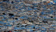 A general view of the Syrian town of Atimah, Idlib province, seen in this picture taken from Reyhanli, Hatay province, Turkey October 10, 2017. REUTERS/Osman Orsal