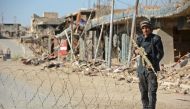 A member of the Iraqi forces guards a checkpoint in the northern Iraqi city of Baiji on November 27, 2017. (AFP PHOTO / Mahmud SALEH).