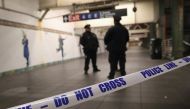 Police stand in a closed-off underground walkway near the site of a pipe bomb explosion on December 11, 2017 in New York City. John Moore/Getty Images/AFP