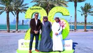 Saleh Al Mana, Vice President and Director of Government and Public Affairs for ExxonMobil Qatar; Tareq Zeinal, Secretary General Assistant of Qatar Tennis Federation and Karim Alami, Tournament Director pose for a picture, after kick starting a series of