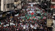 People attend a protest against U.S. President Donald Trump's recognition of Jerusalem as Israel's capital, in Amman, Jordan on December 15, 2017. ( Shadi Nsoor - Anadolu Agency ).