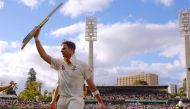 Australia's captain Steve Smith celebrates with team mate Mitchell Marsh as they walk off the field at the end of the third day of the third Ashes cricket test match. REUTERS/David Gray