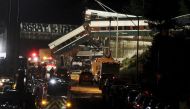 The scene where an Amtrak passenger train derailed on a bridge over interstate highway I-5 in DuPont, Washington, U.S. December 18, 2017. REUTERS/Steve Dipaola TPX IMAGES OF THE DAY.