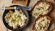 Garlic-Rosemary White Bean Toasts take all of 15 minutes to whip up with ingredients that are easy to keep on hand - so it's perfect for surprise guests. (Photo by Deb Lindsey for The Washington Post)
