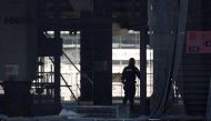 A man works at the construction site of the New National Stadium, main stadium of Tokyo 2020 Olympics and Paralympics, in Tokyo. The nation’s unemployment rate stood at 2.7 percent last month, the lowest since 1993. REUTERS.