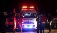 Syrian staff from the International Committee of the Red Cross take part in an evacuation operation in Douma in the eastern Ghouta region on the outskirts of the capital Damascus late on December 26, 2017. / AFP.