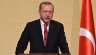 Turkish President Recep Tayyip Erdogan speaks during a press conference with his Tunisian counterpart on December 27, 2017 at Carthage palace near Tunis.   / AFP / FETHI BELAID