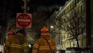 NEW YORK: Firefighters put out a major house fire on Prospect avenue on December 29, 2017 in the Bronx borough of New York City. Amir Levy/Getty Images/AFP