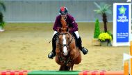 Qatari rider Hamad Nasser Al Qadi guides Galwaybay Merbreaker over an obstacle during the fourth leg of Hathab Series at Al Shaqab Arena in this file photo.