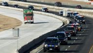 A procession of police vehicles escorts the hearse carrying the body of a deputy killed in a domestic disturbance where multiple deputies and civilians were shot in Highlands Ranch, Colorado, U.S. December 31, 2017. REUTERS/Rick Wilking.