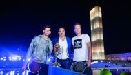 Top seed at the Qatar Exxonmobil Open, Dominic Thiem of Austria (left) and Tomas Berdych of Czech Republic pose for a photograph with Tournament Director Karim Alami (centre).