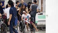 A man injured by firecrackers is being taken care of at the Jose Reyes Memorial Medical Center in Manila early on January 1, 2018, after new year's celebrations. / AFP.