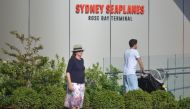 Visitors at the entrance to the Sydney Seaplanes terminal in Rose Bay, Sydney: six people died after one of its aircraft crashed (AFP Photo/Peter PARKS).