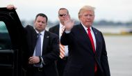 U.S. President Donald Trump arrives to board Air Force One to return to Washington at the conclusion on their holiday vacation, from Palm Beach International Airport in West Palm Beach, Florida, U.S. January 1, 2018. REUTERS/Jonathan Ernst
