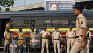 Policemen stand guard at a traffic junction in Mumbai, India, January 3, 2018. REUTERS/Danish Siddiqui
