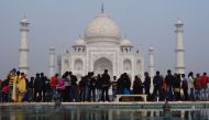 Crowds gather to visit the Taj Mahal in Agra on January 3, 2018. AFP / Dominique Faget 