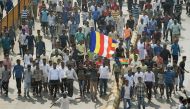 Republican Party of India (RPI) supporters walk during a protest in the streets of Mumbai on January 3, 2018. AFP / PUNIT PARANJPE
