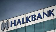 (FILES) This file photo taken on December 2, 2017 shows the logo of the Turkish Halkbank in Istanbul. AFP / OZAN KOSE