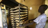 A Sudanese man works at a bakery in the capital Khartoum on January 5, 2018. AFP / Ashraf Shazly