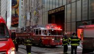 New York Fire Department crew respond after a fire broke out at Trump Tower in Manhattan, New York City, U.S. January 8, 2018. REUTERS/Andrew Kelly