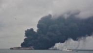 Smoke is seen from Panama-registered tanker SANCHI carrying Iranian oil after it collided with a Chinese freight ship in the East China Sea, in this still image taken from a January 7, 2018 video. China Central Television (CCTV) via REUTERS TV. 