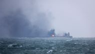 This handout photo from the Transport Ministry of China taken and released on January 9, 2018 shows smoke and flames coming from the burning oil tanker 'Sanchi' at sea off the coast of eastern China. AFP PHOTO / TRANSPORT MINISTRY OF CHINA