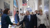 Russian President Vladimir Putin visits his election campaign office in Moscow on January 10, 2018. Russia's presidential election is scheduled for March 18, 2018. / AFP / SPUTNIK / Alexey DRUZHININ
