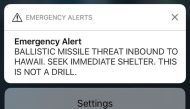 A screen shot take by Hawaiian citizen Alison Teal shows the screen of her mobile phone with an alert text message sent to all Hawaiian citizens on January 13, 2018. / AFP / Alison TEAL