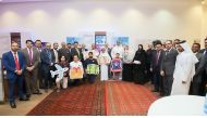 Commercial Bank officials with the fourth monthly winners of the bank’s ‘Save & Win’ campaign.