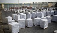 Boxes containing aid from the U.N. Relief and Works Agency (UNRWA) are seen ahead of their transfer to the Gaza Strip, inside the Kerem Shalom border crossing terminal between Israel and Gaza Strip January 16, 2018. Reuters/Amir Cohen