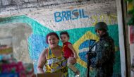 Brazilian army soldiers patrol the Rocinha favela in Rio de Janeiro on October 11, 2017 (AFP / Mauro Pimentel) 