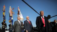 U.S. President Donald Trump speaks to reporters as he arrives for a meeting at the Pentagon, accompanied by U.S. Defense Secretary Jim Mattis and Vice President Mike Pence in Arlington, Virginia, U.S., January 18, 2018. Reuters/Carlos Barria