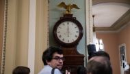 The Ohio Clock strikes 12 o'clock midnight as Senate Majority Leader Mitch McConnell tries to broker a deal with Democrats on the continuing resolution in the US Capitol in Washington, DC, USA, 19 January 2018. EPA/SHAWN THEW
