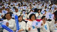 (FILES) This file photo taken on April 06, 2017 shows South Korean fans waving 