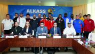Officials of participating teams and members of the organising committee pose for a photograph during the technical meeting held at the Torch Hotel in Doha ahead of the seventh Al Kass International Cup yesterday. 