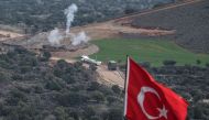 Turkish artillerys shell the People's Protection Units (YPG) positions near the Syrian border on January 21, 2018 near Hassa, in the Turkish province of Hatay, as Turk's ground troops entered Syria today to push an offensive against Kurdish militia as roc